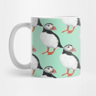 Puffin pattern light green background Mug